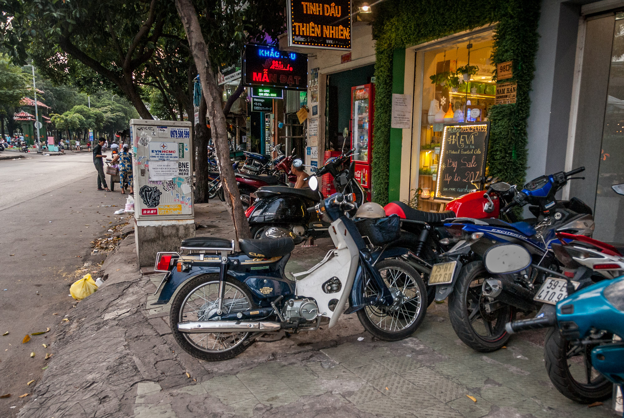 Motorbikes parked on sidewalk