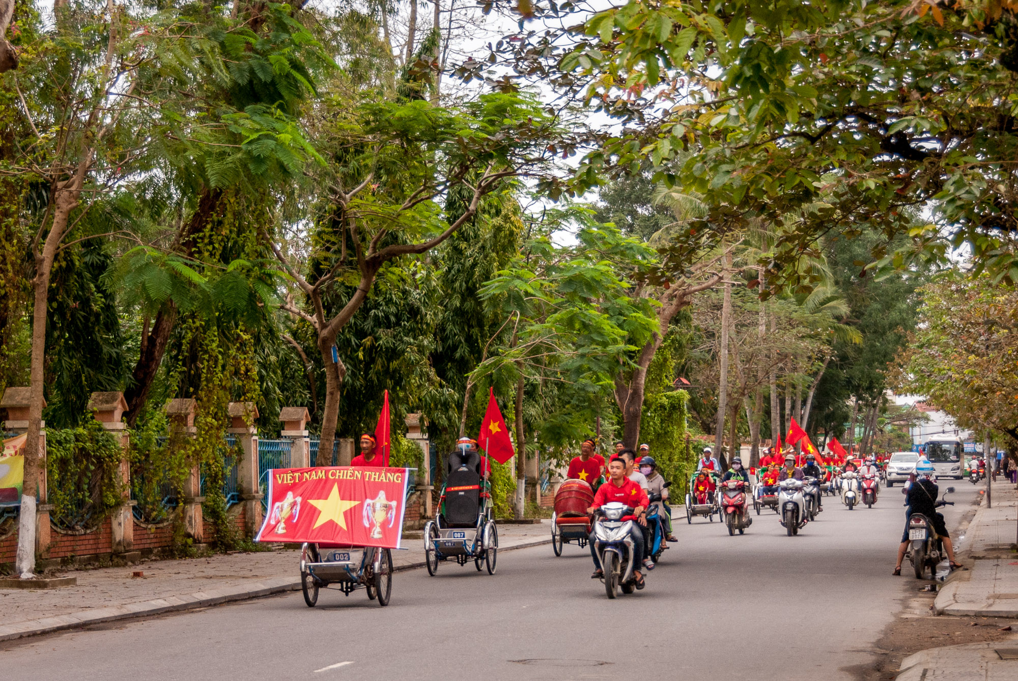 Motorbikes parade through Hoi An